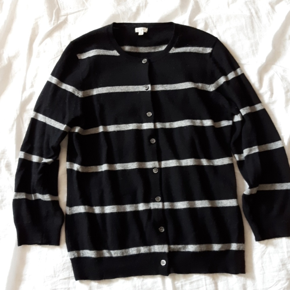 A black and gray striped cardigan sweater